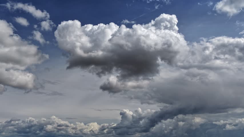 Aerial view of turbulent storm clouds with thick formations across the horizon in Santa Fe, New Mexico, United States.
