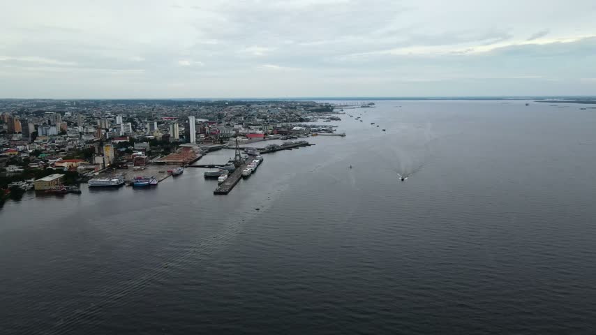 Aerial view of the port of Manaus with boats docked along the Amazon River in Manaus, Amazonas, Brazil.