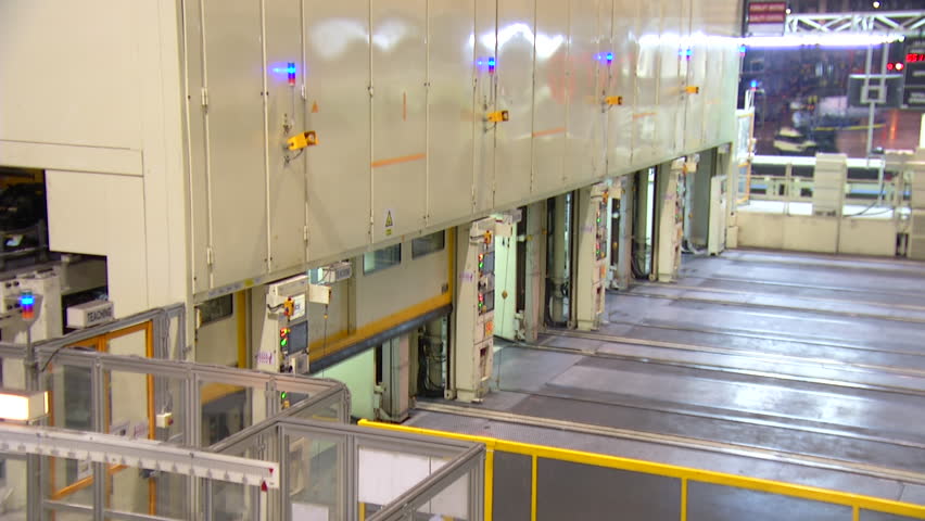 Pressing sheet metal in automotive factory