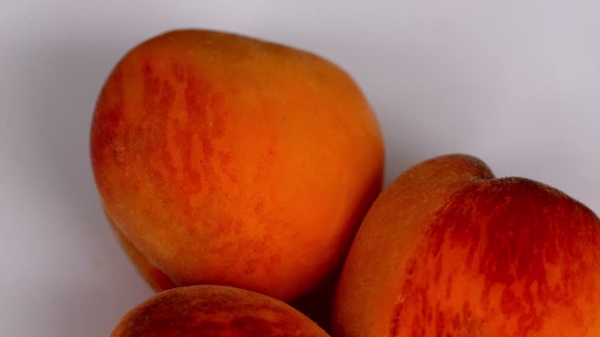 Fresh ripe peaches in 4K for healthy food, retail and fruit market concepts