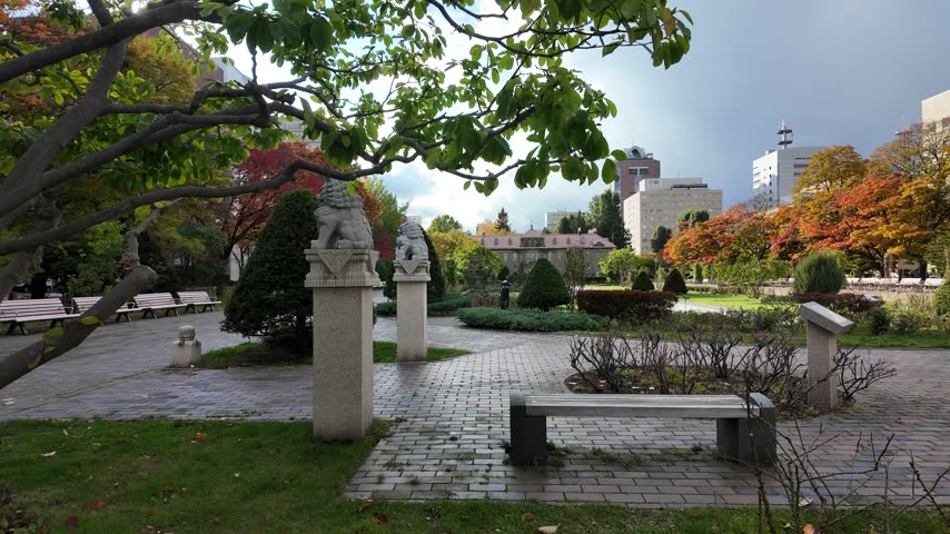 Odori Park in Sapporo with Guardian Lions and Autumn Foliage