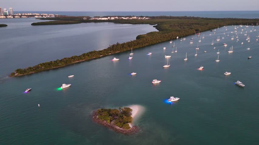 Aerial view of boats anchored near a small island by the Rickenbacker Causeway in Key Biscayne, Florida, United States.