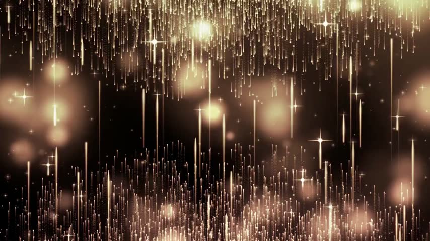 Elegant golden particle sparks rising and falling smoothly on dark background, luxury event concept.