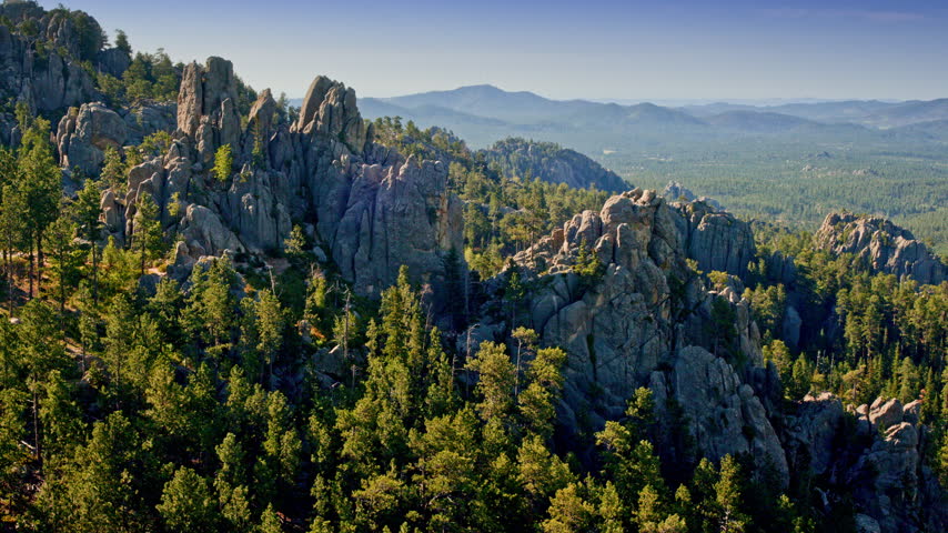 Cinematic drone shot capturing rugged rock formations in the wilds of South Dakota’s Black Hills.