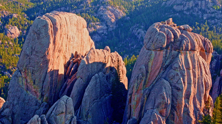 Aerial view of impressive rock formations rising from the wilderness of the Black Hills in South Dakota.
