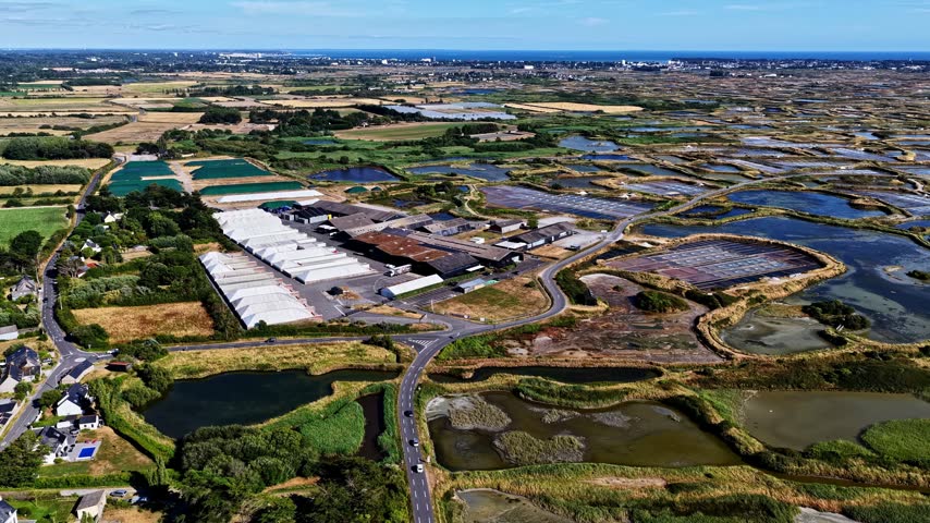 Aerial view of salt marshes and industrial buildings in Nantes, Pays de la Loire, France.