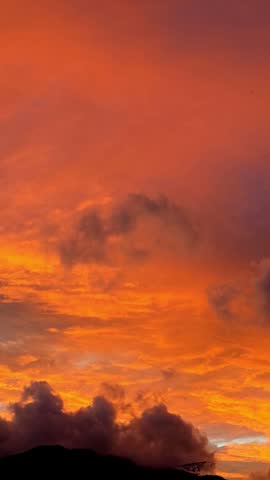 Amazing and colorful sunset with some clouds
