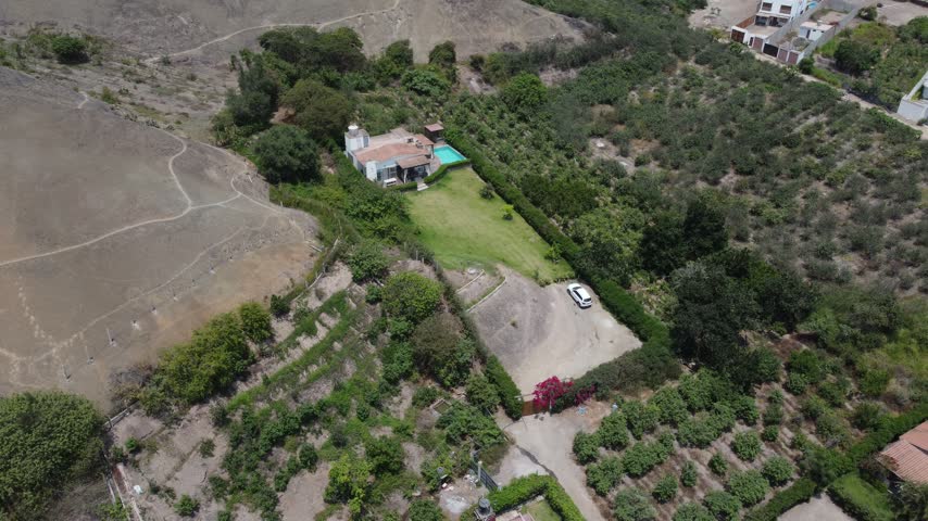 Aerial view of a country house with swimming pool in peru