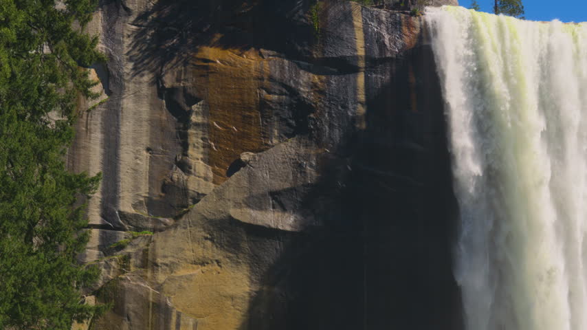 Cinematic slow motion shot of Vernal Falls on Mist Trail in Yosemite National Park in California, USA
