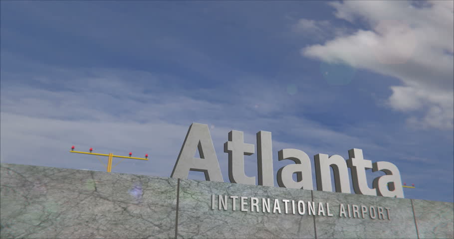 Plane landing at the airport Atlanta. Jet airplane travel to Georgia USA and arrive with city sign.