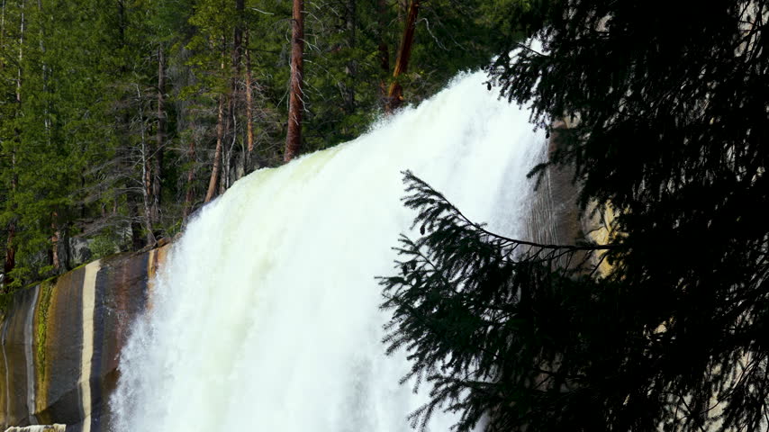 Cinematic slow motion shot of Vernal Falls on Mist Trail in Yosemite National Park in California, USA