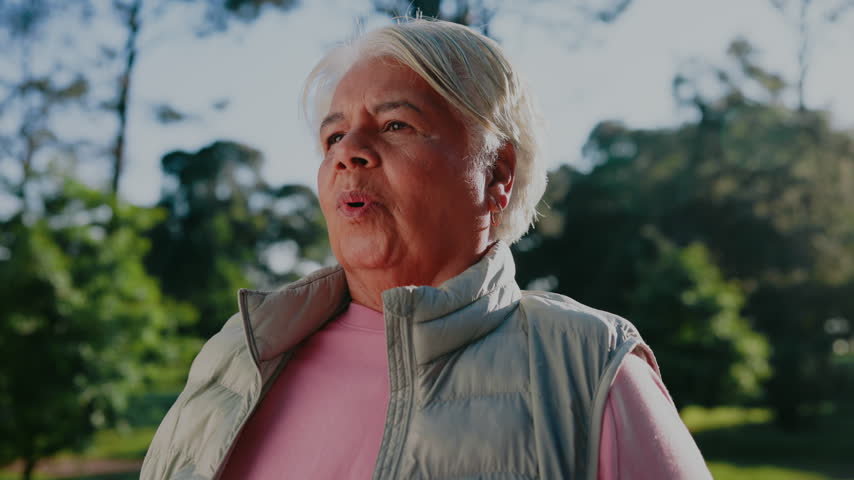 Thinking, smile and old woman outdoor with breathing, daydream and nostalgia in calm mindset. Retirement, reflection and elderly person with fresh air, flashback and peaceful perspective in park