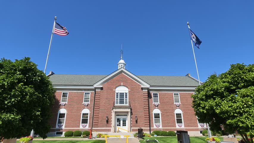 Grand Haven, Michigan City Hall exterior with gimbal video walking forward.