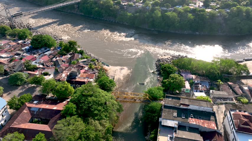 Honda and Its Bridges over the Magdalena River Surrounded by Mountain Landscape in Colombia. Establishing Shot. Aerial View.