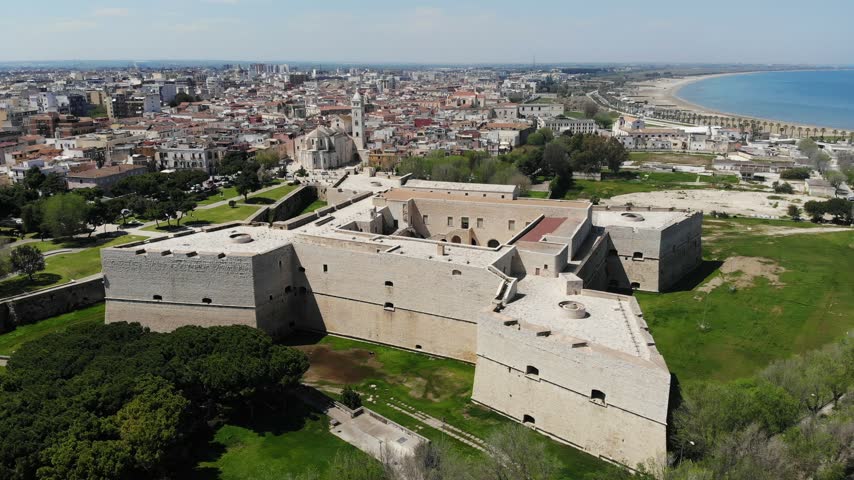 Cityscape of Barletta city in Italy. City in Apulia region of Southern Italy. Castle with ravelin fortifications.