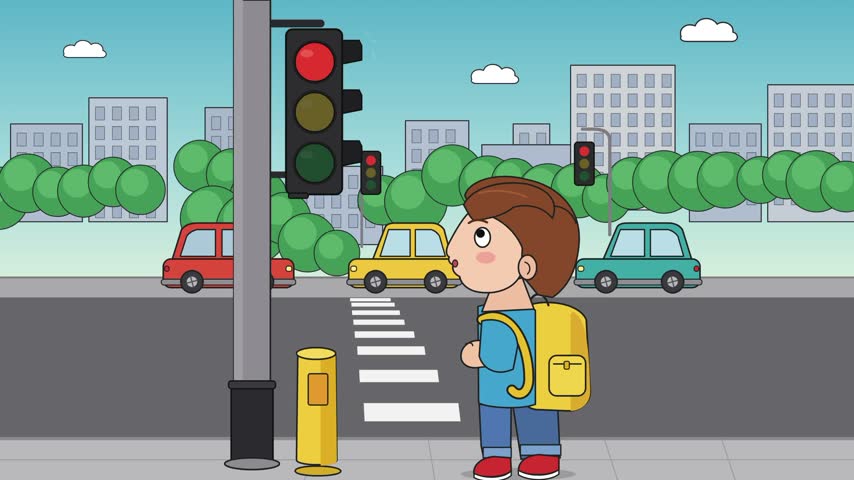 An animated video scene featuring a young schoolboy with a yellow backpack standing at a pedestrian crossing in a city. The child waits safely at the traffic light on the sidewalk, watching the street before crossing. The background shows urban architecture, cars driving on the road, and green trees under a clear blue sky, illustrating pedestrian safety and rules for children in a colorful 2D cartoon style.