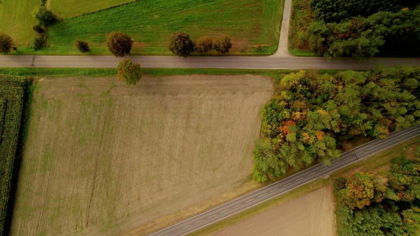 Top down view on a road in polish countryside at autumn.