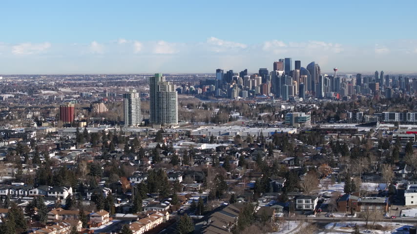 Aerial view of the downtown Calgary skyline and surrounding neighborhoods on a winter day, Alberta, Canada.