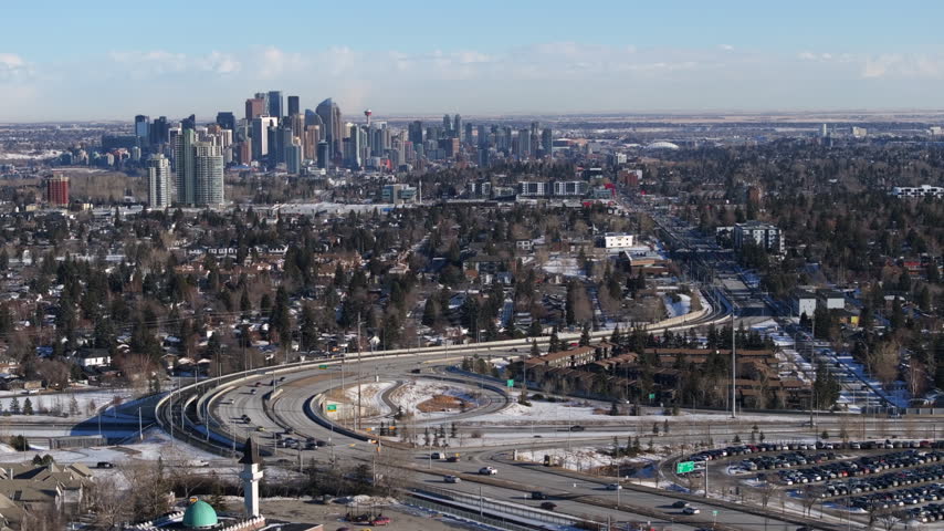 Aerial view of the downtown Calgary skyline and surrounding neighborhoods on a winter day, Alberta, Canada.