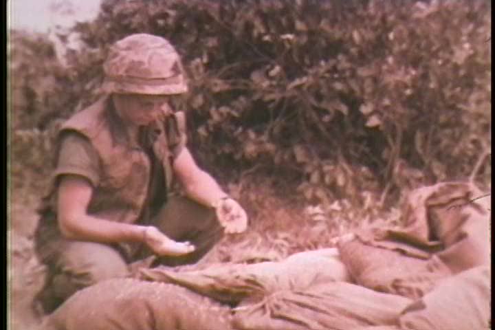 1960s - Soldiers search a local village for potential Vietcong during the Vietnam War
