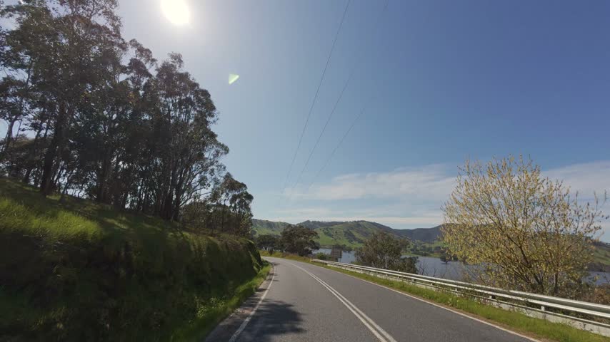 Driving POV of crossing the Mitta Mitta River at Old Tallangatta