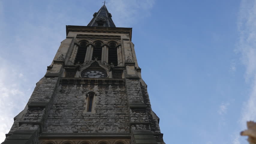 Low Angle View of Historic Stone Church Tower
