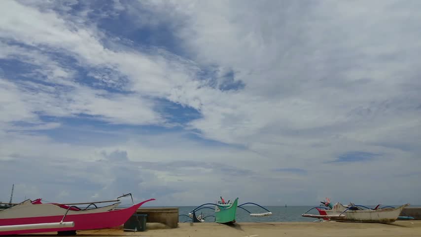 fishing boat, sea, embankment, clouds.