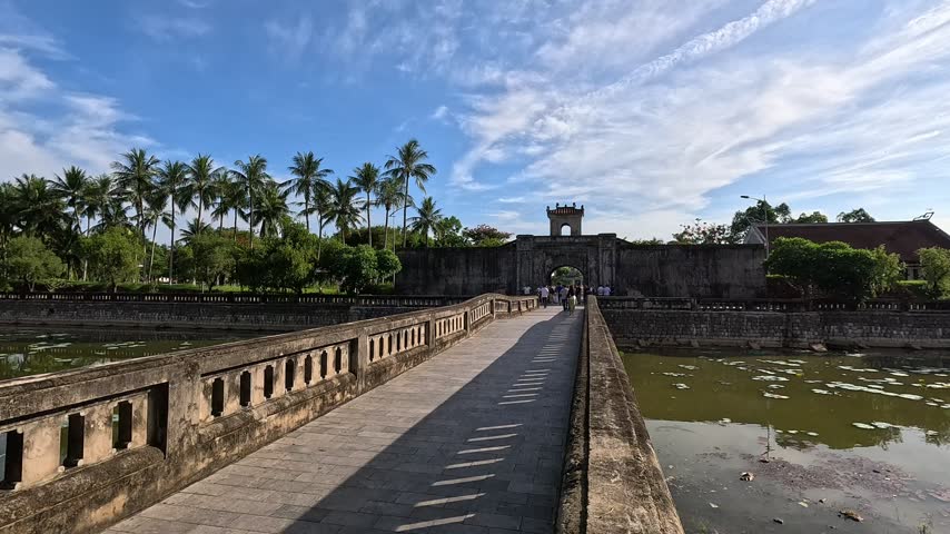 Stone bridge leading directly to the entrance gate of Quang Tri Ancient Citadel in Vietnam.