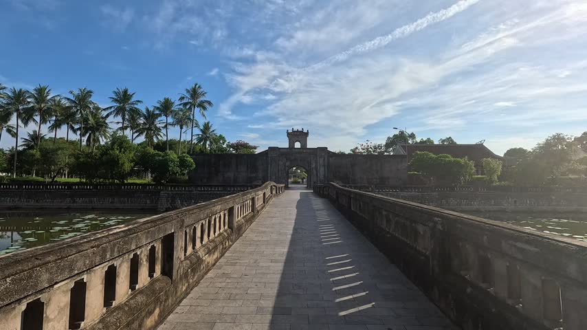 Stone bridge leading directly to the entrance gate of Quang Tri Ancient Citadel in Vietnam.