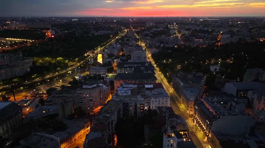 Post-sunset aerial view of central Bucharest city skyline, Romania