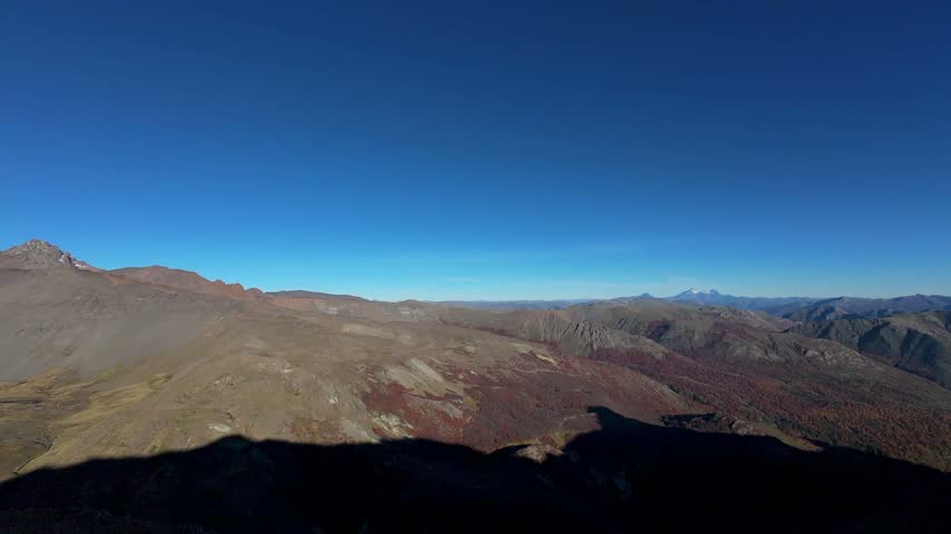 Sweeping Mountain Valley And Volcanic Terrain At Nevados De Chillán In The Chilean Andes