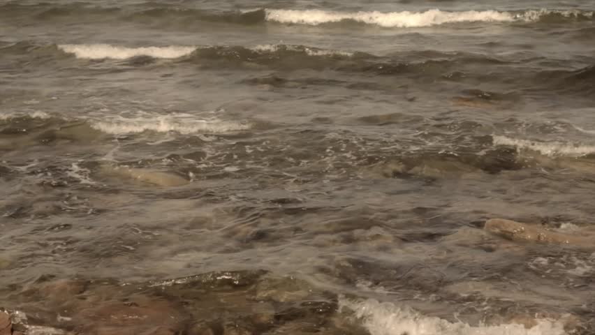 A jib shot of a rocky ocean shoreline