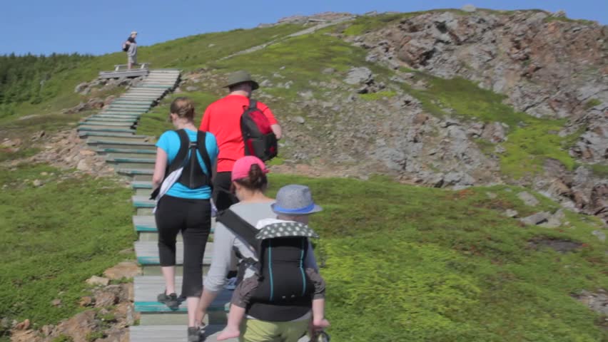 Hikers on the beautiful skyline trail in cape breton nova scotia