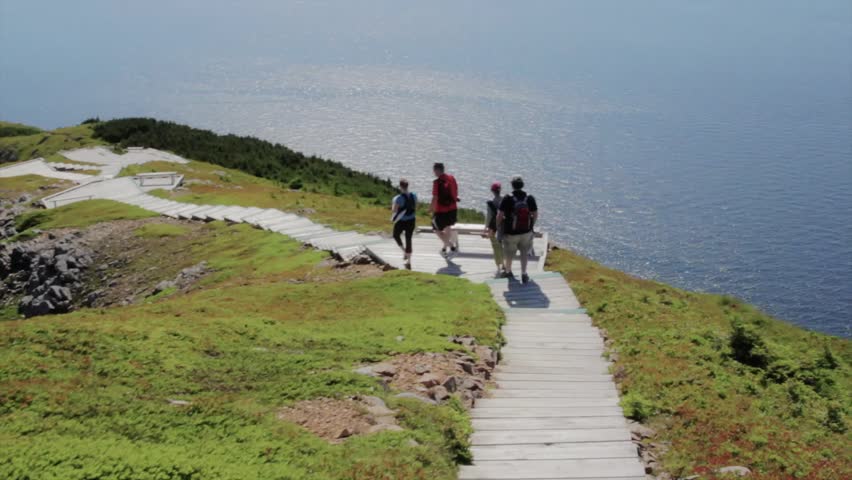 Hikers on the beautiful skyline trail in cape breton nova scotia