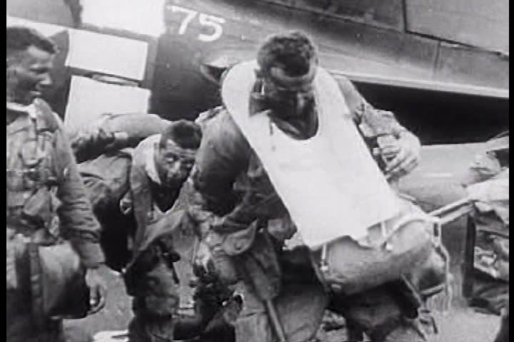 1940s - A group of para-troopers load planes and take off to commence D-Day during the 1940s