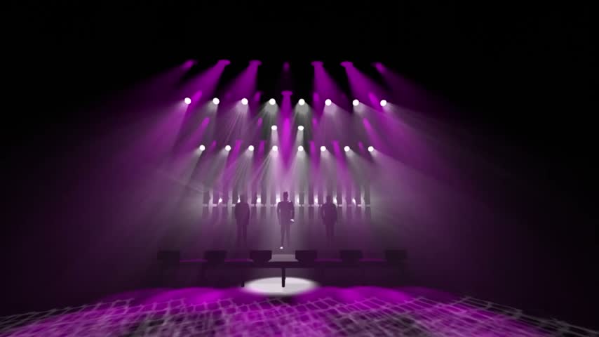 Colorful stage lights shift from purple to red around a silhouetted performer, illuminating haze, speakers, and a reflective floor in a dark venue