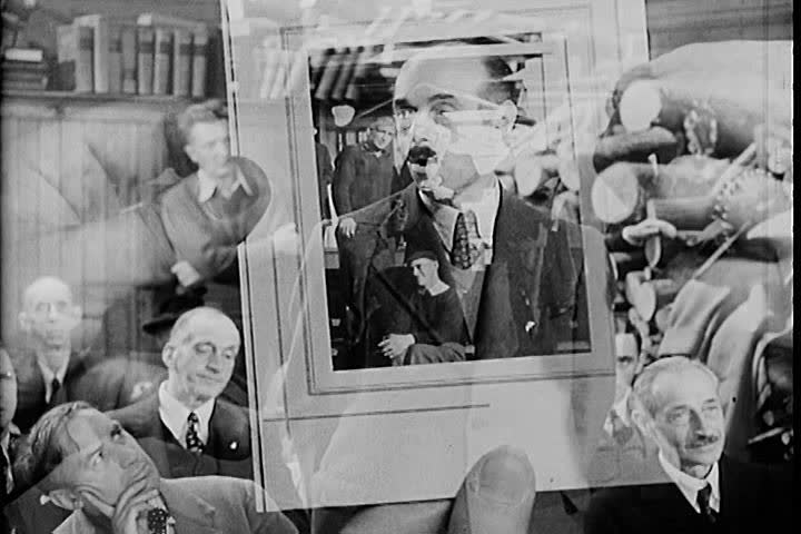 1940s - A refugee speaks at a town meeting in the 1940s
