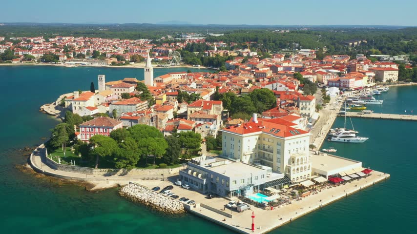 Panorama of coastal town of Porec in Istria, Adriatic sea in Croatia, with harbor and promenade