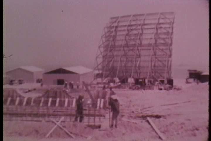 1960s - Vietnamese construction workers build a communications station for the United States military during the Vietnam War