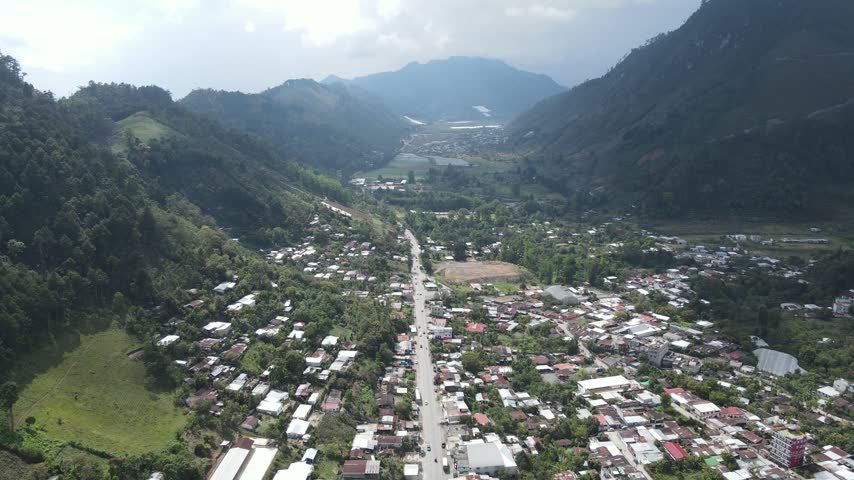 Aerial view of a small town in a mountain valley in Guatemala.