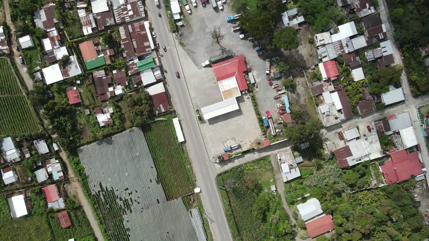 Top down view of a road and houses in a rural town in Guatemala.