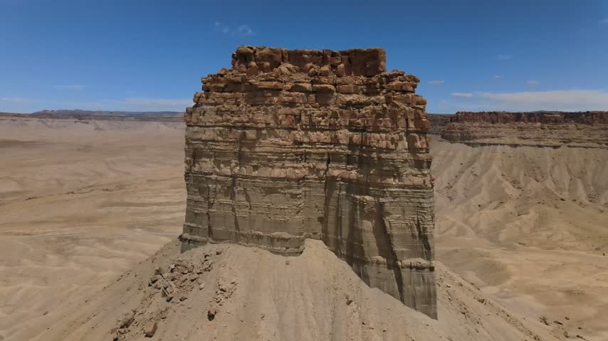 Isolated Factory Butte sandstone monolith in San Rafael Desert, Wayne County near Hanksville and Capitol Reef, Utah