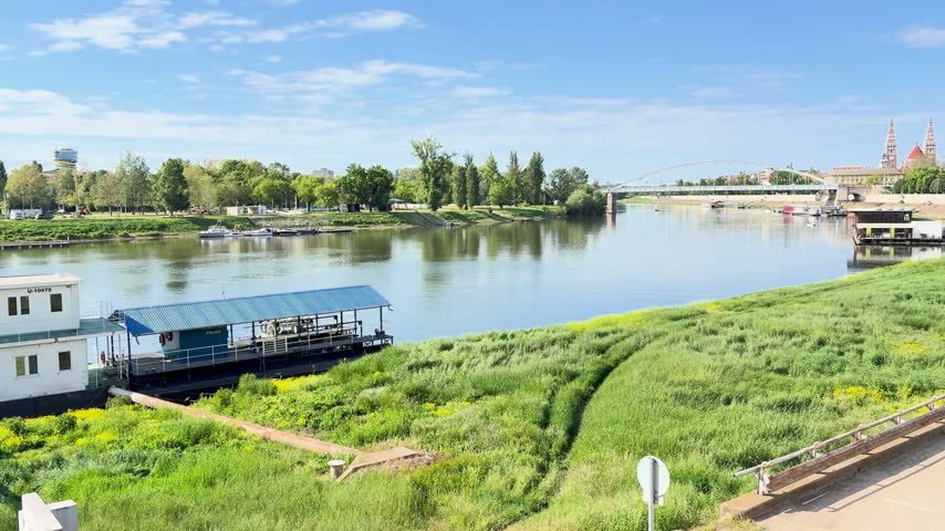 Tisza river and the towers of the Votive Church in Szeged, Hungary