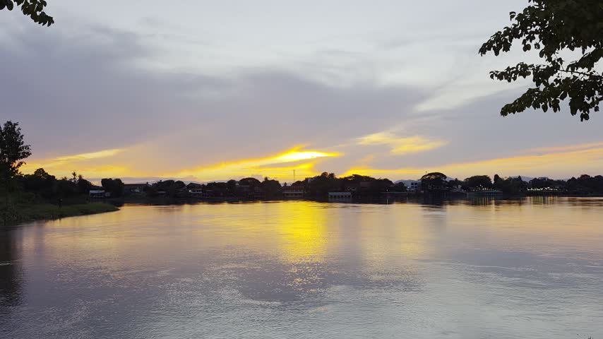 Title: sunset over the river