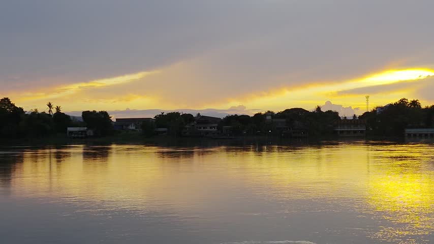 Title: sunset over the river