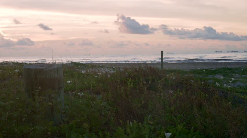Early morning on a peaceful beach in Galveston, Texas