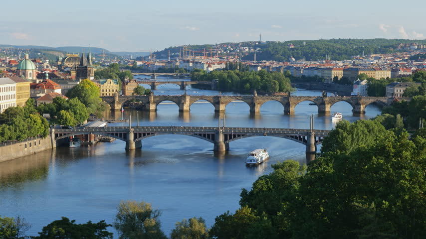 Bridges across River Vltava with famous Charles Bridge in city of Prague, Czech Republic.