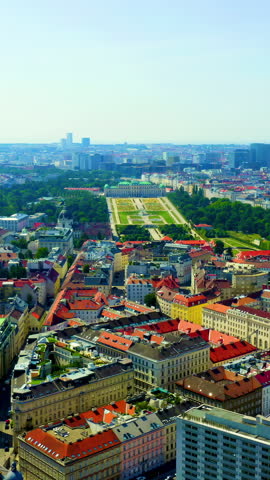 Vertical video. Vienna, Austria. Belvedere is a baroque palace complex in Vienna. Built by Lucas von Hildebrandt at the beginning of the 18th century. Aerial View. Rich colors