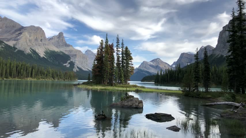 Spirit Island and mountain reflections on Maligne Lake in Jasper National Park, Canada.