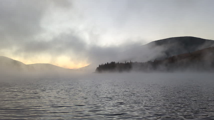 Sunrise on the Nictau Lake at the autumn fall colorful in the Mount Carleton Provincial Park (Saint-Quentin, New Brunswick, Canada)